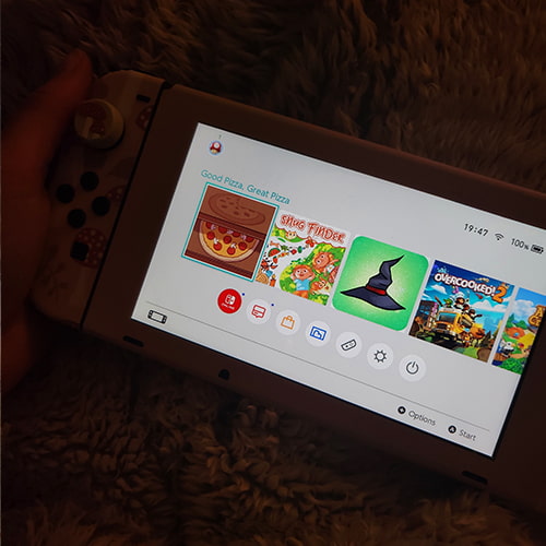 Choosing a game to play in the evening to unwind after work on nintendo switch.